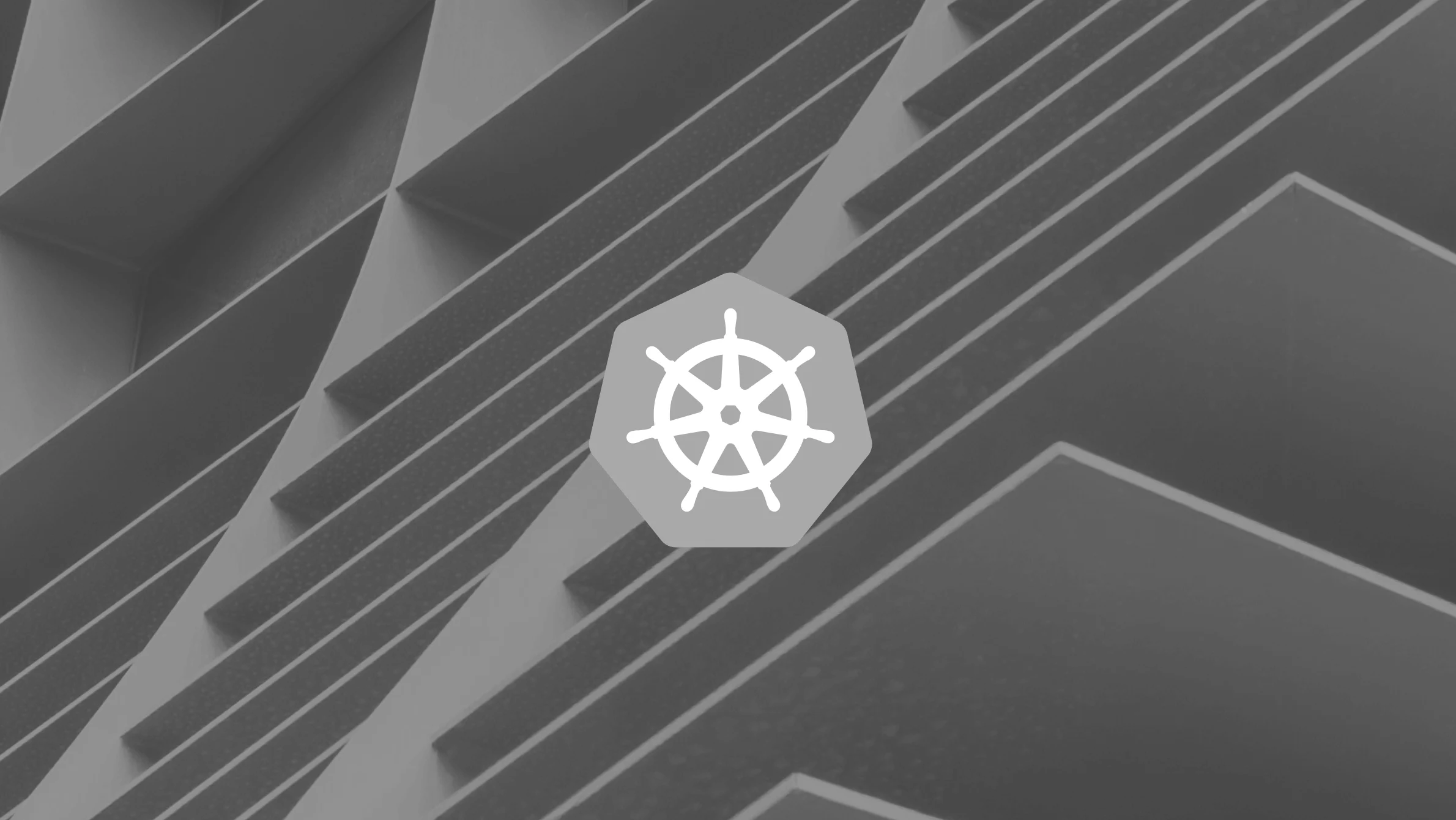 K8s logo on grey background